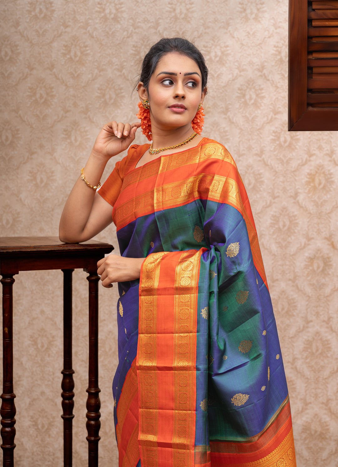 Peacock blue and orange pure kanchipuram silk saree