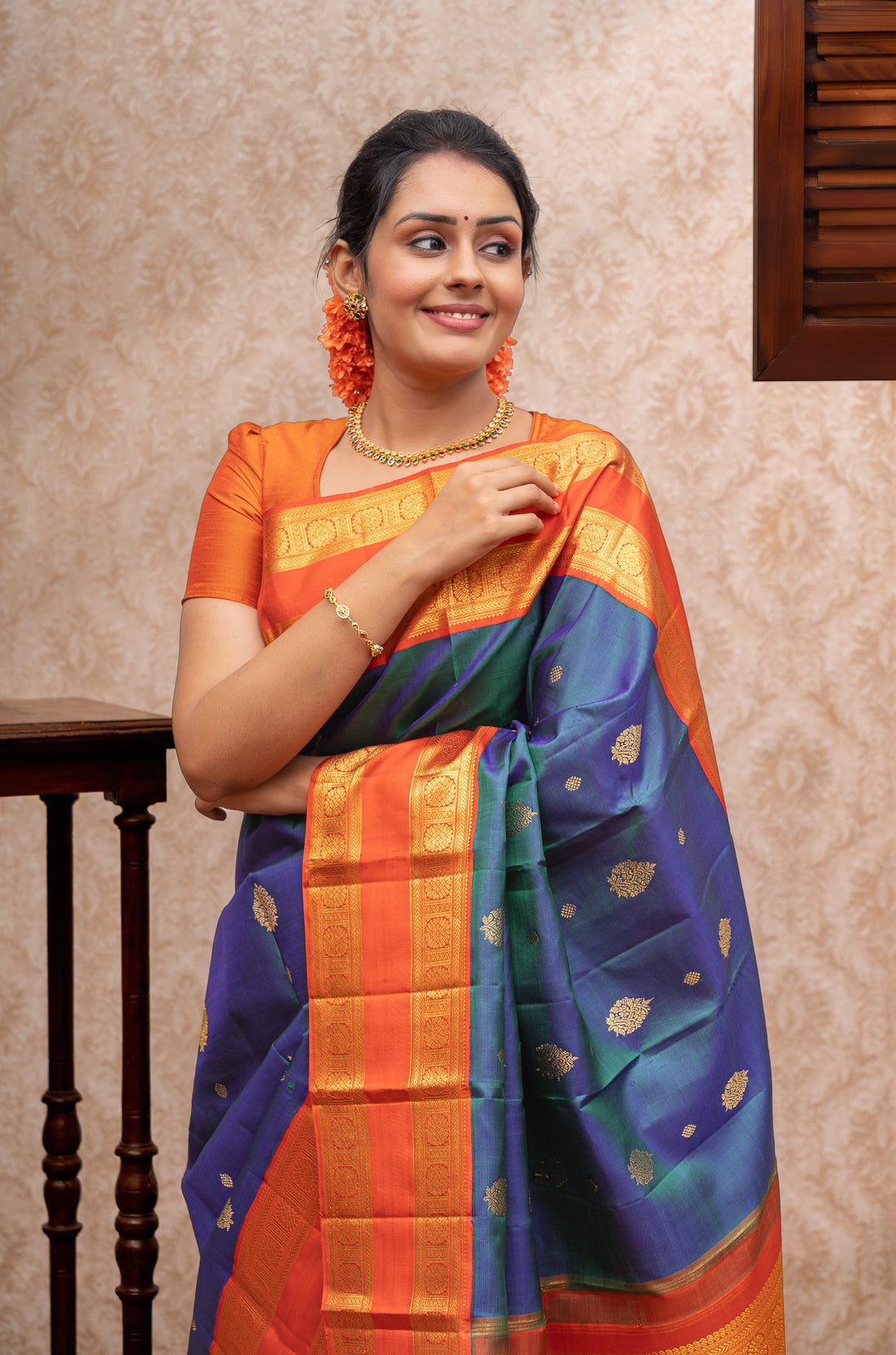 Peacock blue and orange pure kanchipuram silk saree