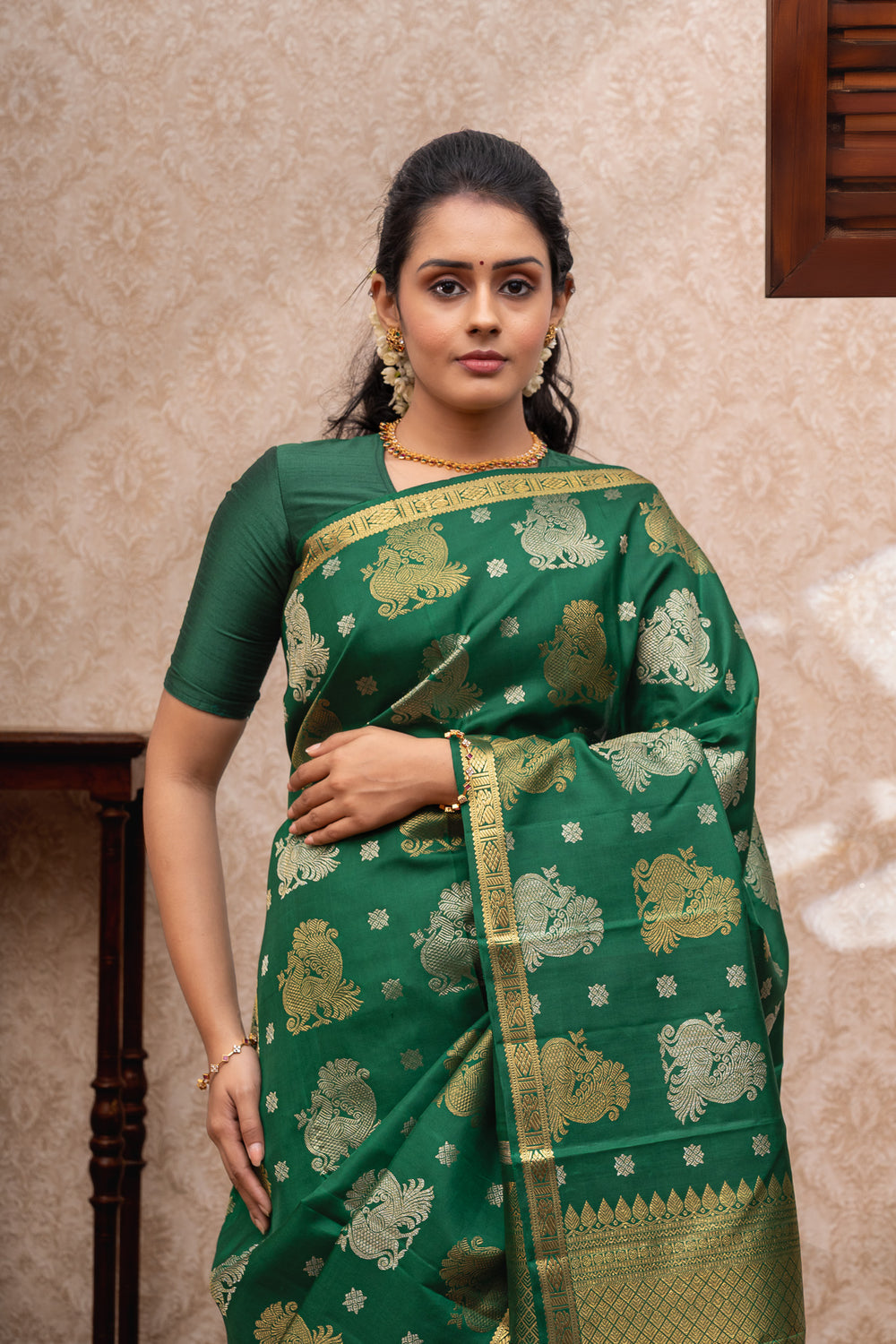 Bottle green vintage motifs pure kanchipuram silk saree