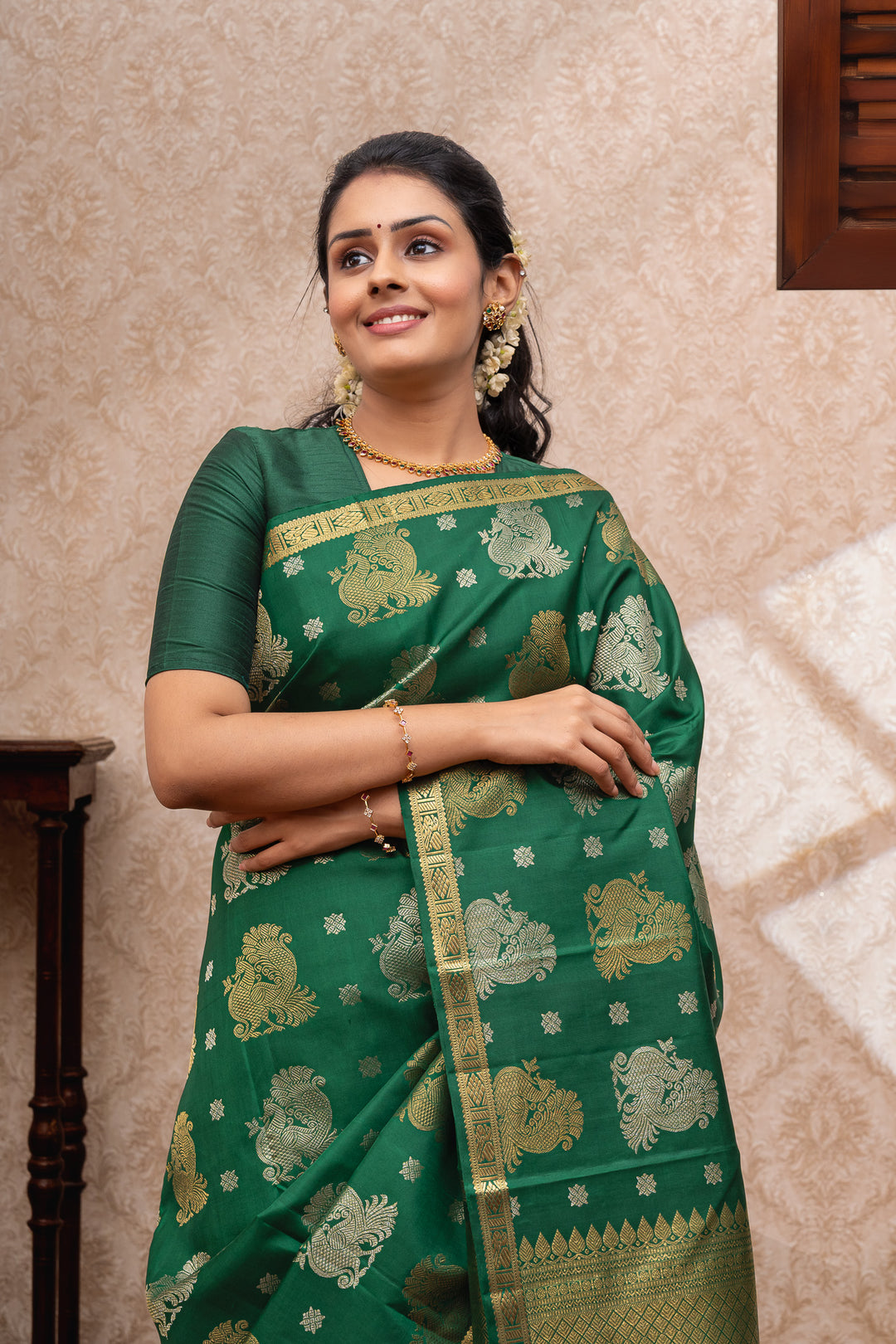 Bottle green vintage motifs pure kanchipuram silk saree