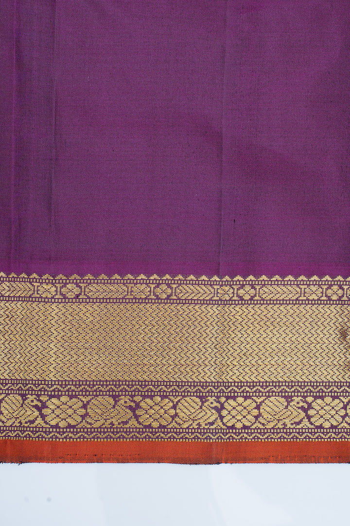 Emerald green and purple pure kanchipuram silk saree