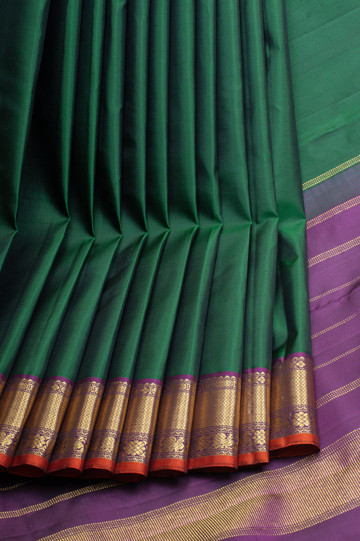 Emerald green and purple pure kanchipuram silk saree
