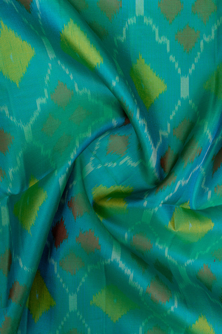 Peacock green ikart pure soft silk saree