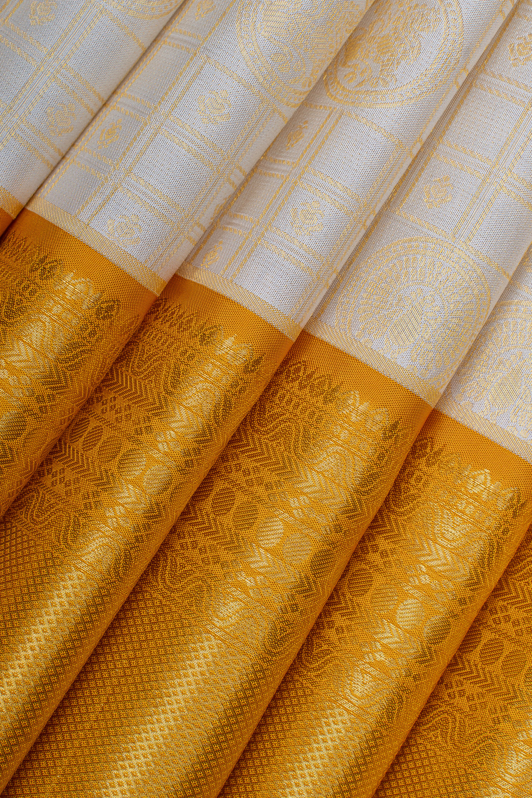 Ivory and yellow brocade pure kanchipuram silk saree