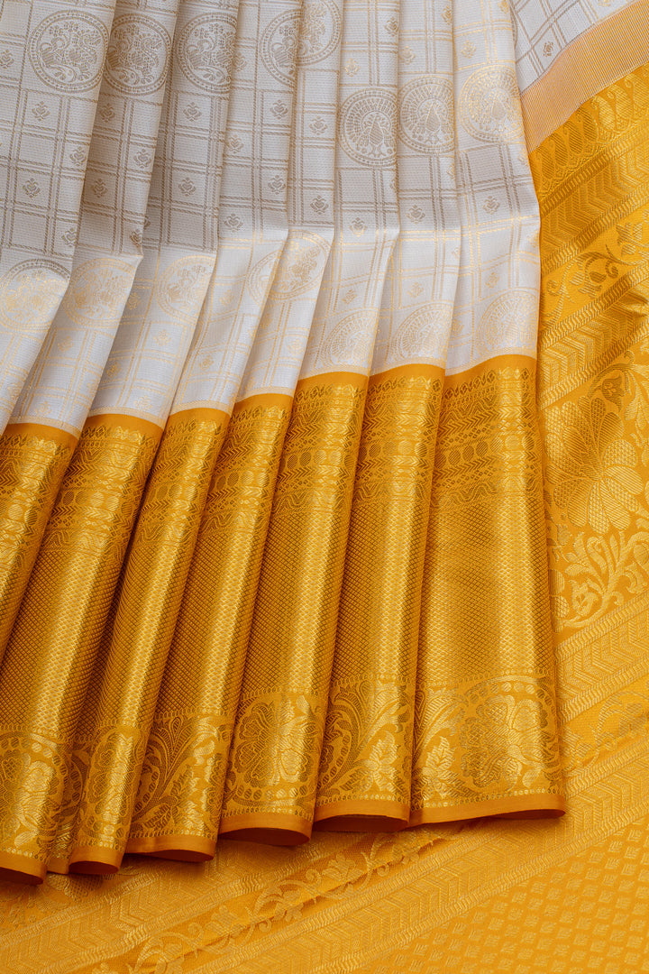 Ivory and yellow brocade pure kanchipuram silk saree