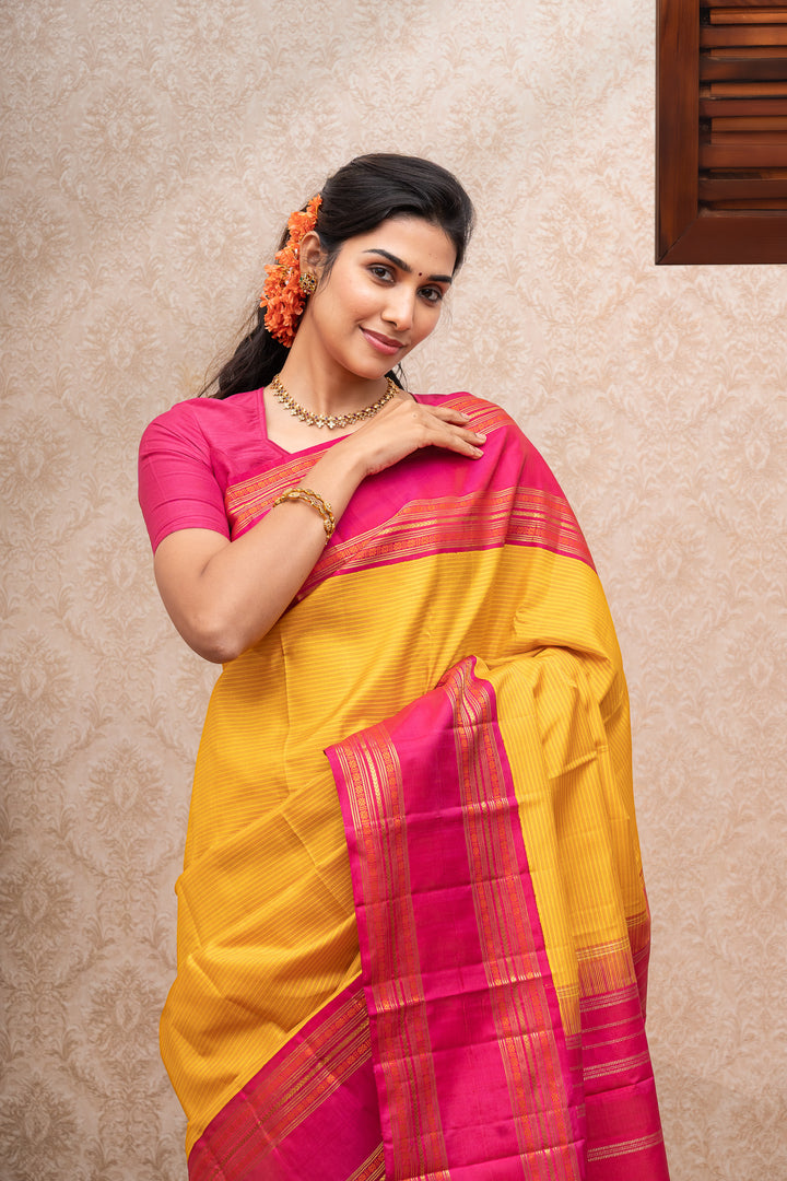 Yellow and pink stripes pure kanchipuram silk saree