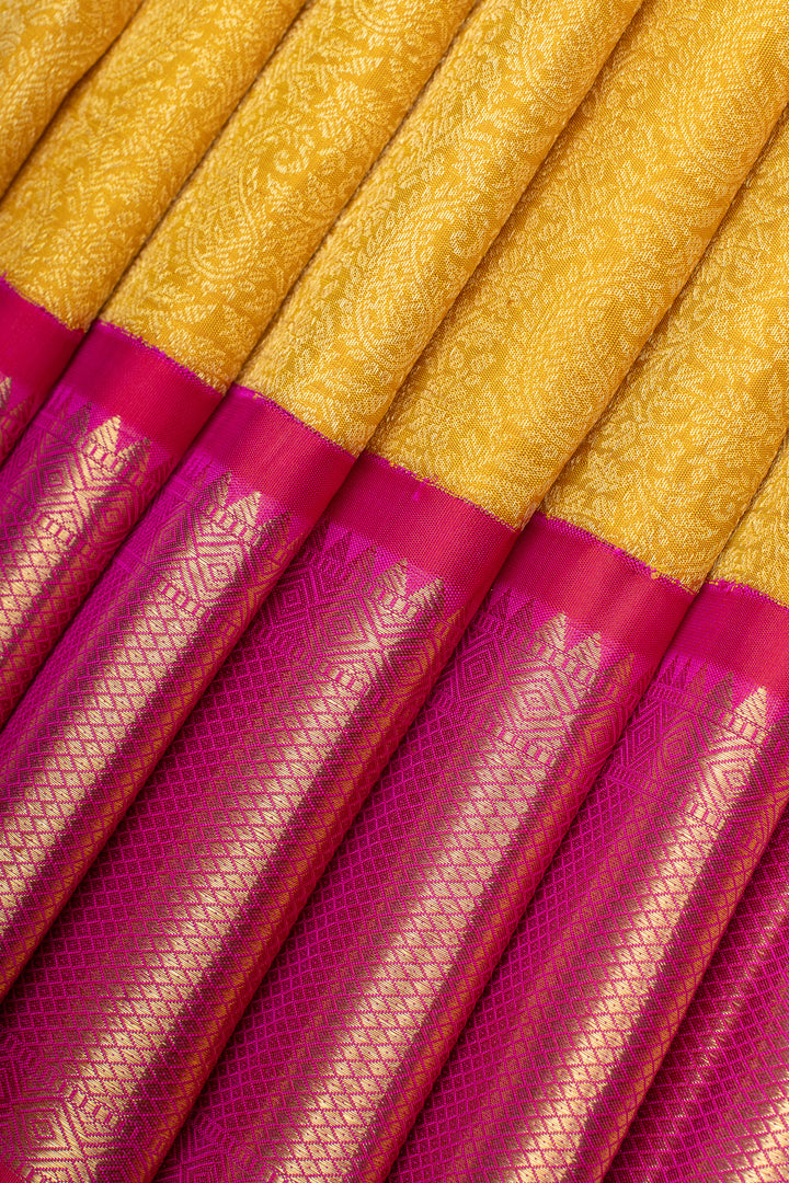 Golden yellow paisley brocade pure kanchipuram silk saree