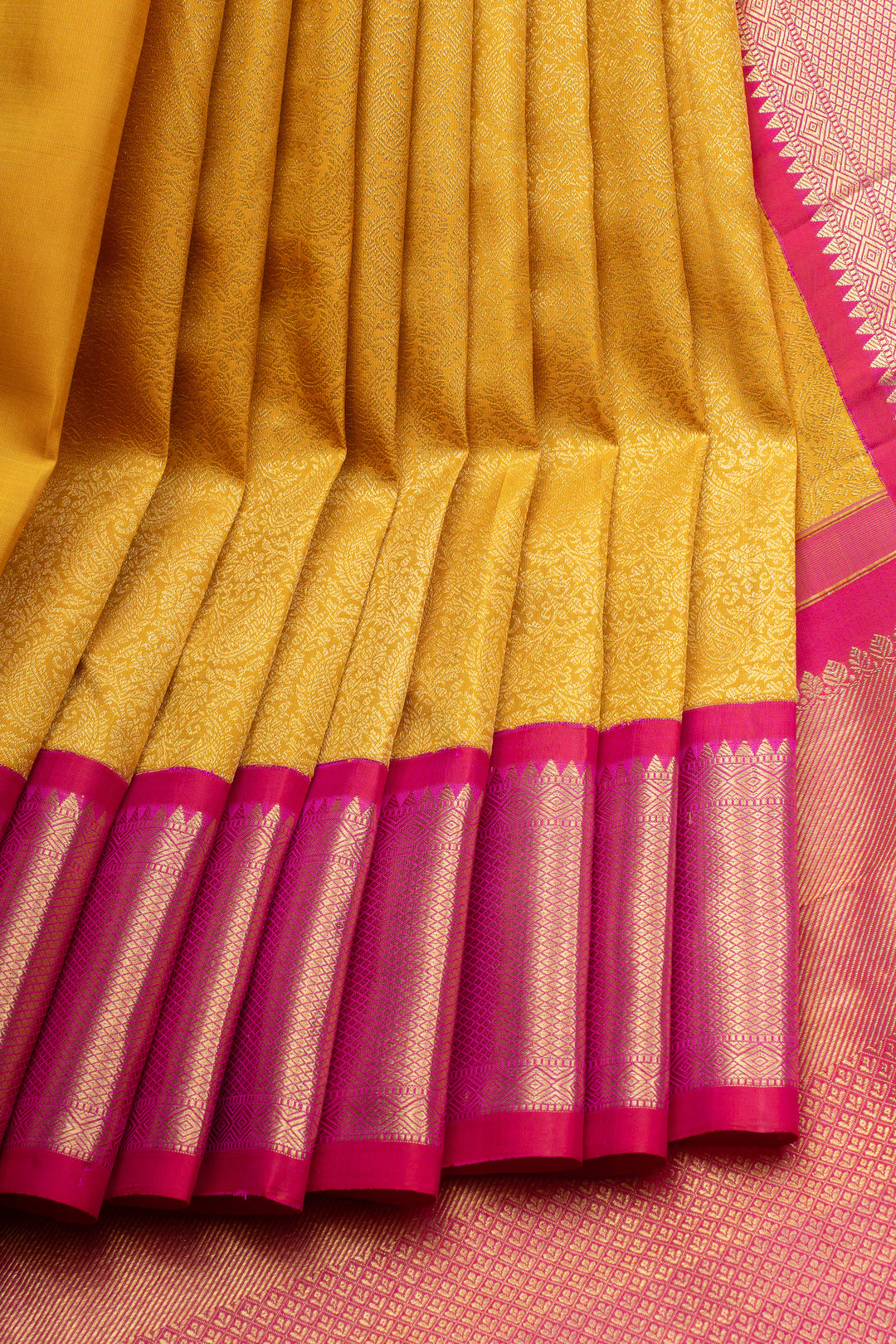 Golden yellow paisley brocade pure kanchipuram silk saree