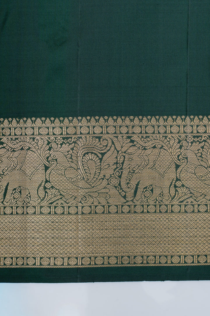 Bottle green lakshadeepam pure Kanchipuram silk saree