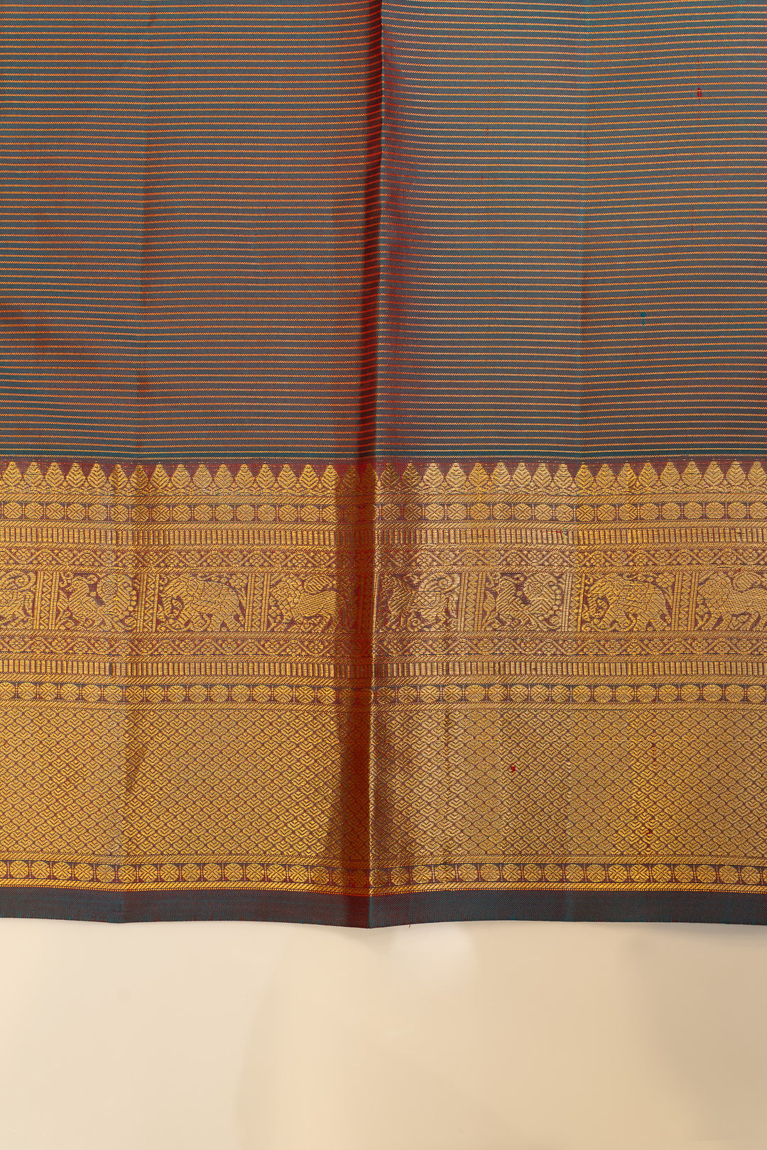 Mandhulir green zari checks pure Kanchipuram silk saree