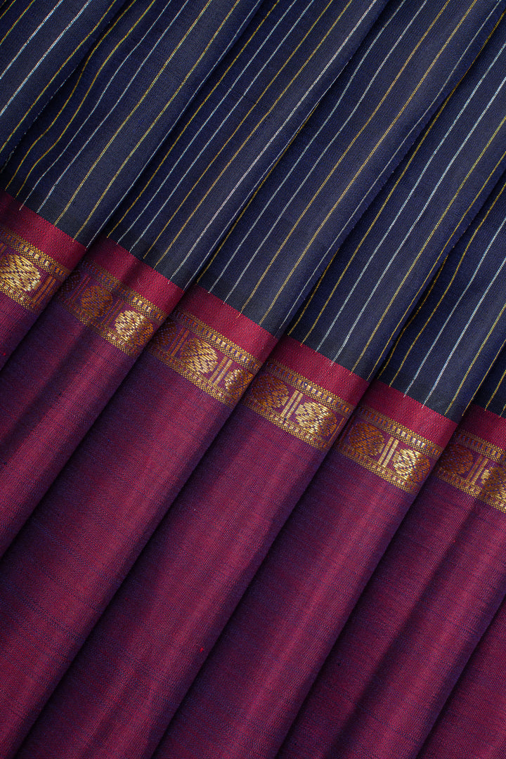 Midnight blue stripes and magenta rettai pettu pure kanchipuram silk saree