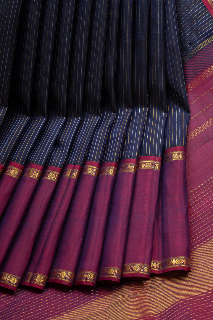 Midnight blue stripes and magenta rettai pettu pure kanchipuram silk saree