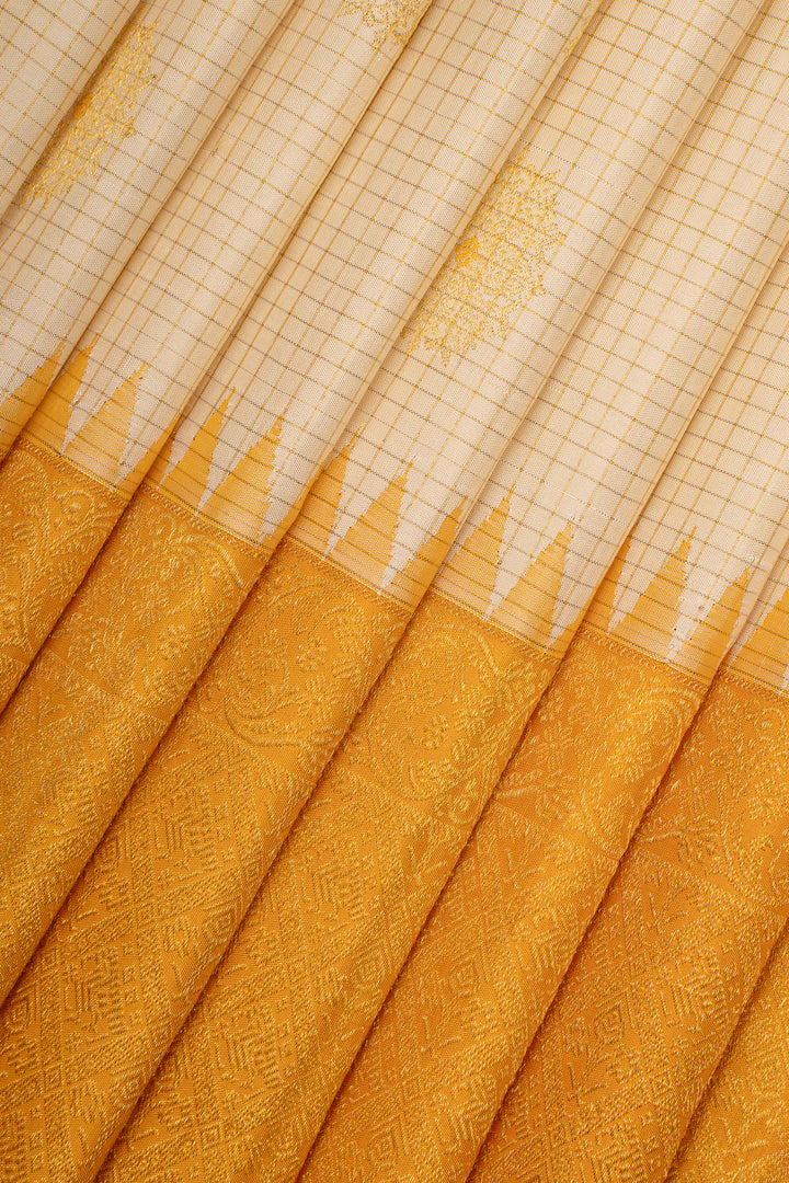 Pearl white and yellow turning border pure kanchipuram silk saree