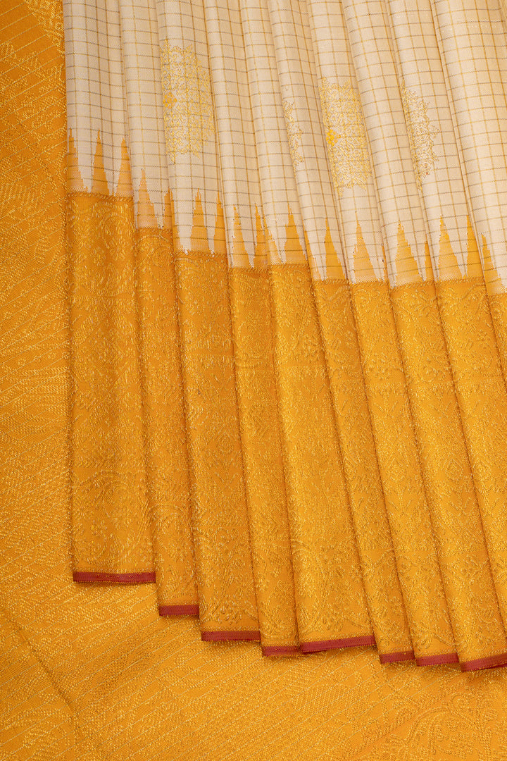 Pearl white and yellow turning border pure kanchipuram silk saree