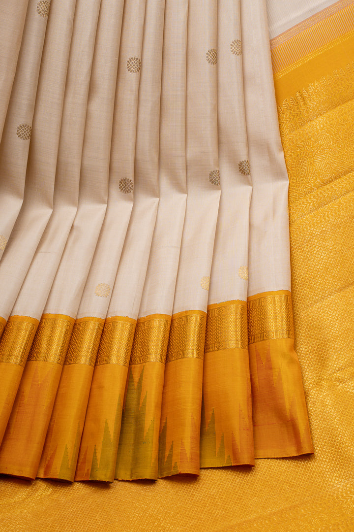 Off white and mustard temple border pure kanchipuram silk saree