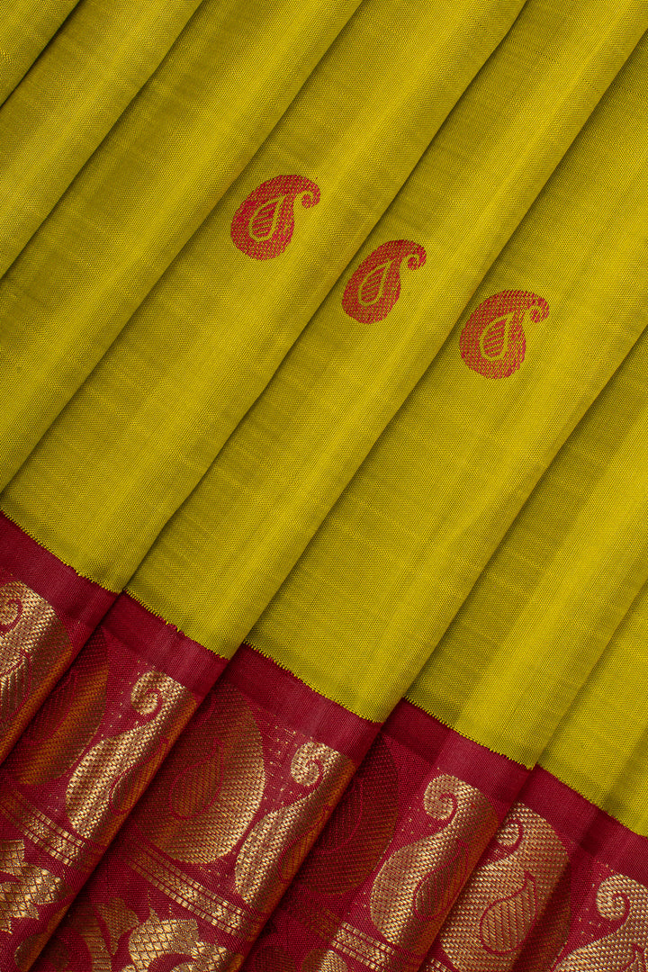 Lime green and red paisley motifs pure kanchipuram silk saree
