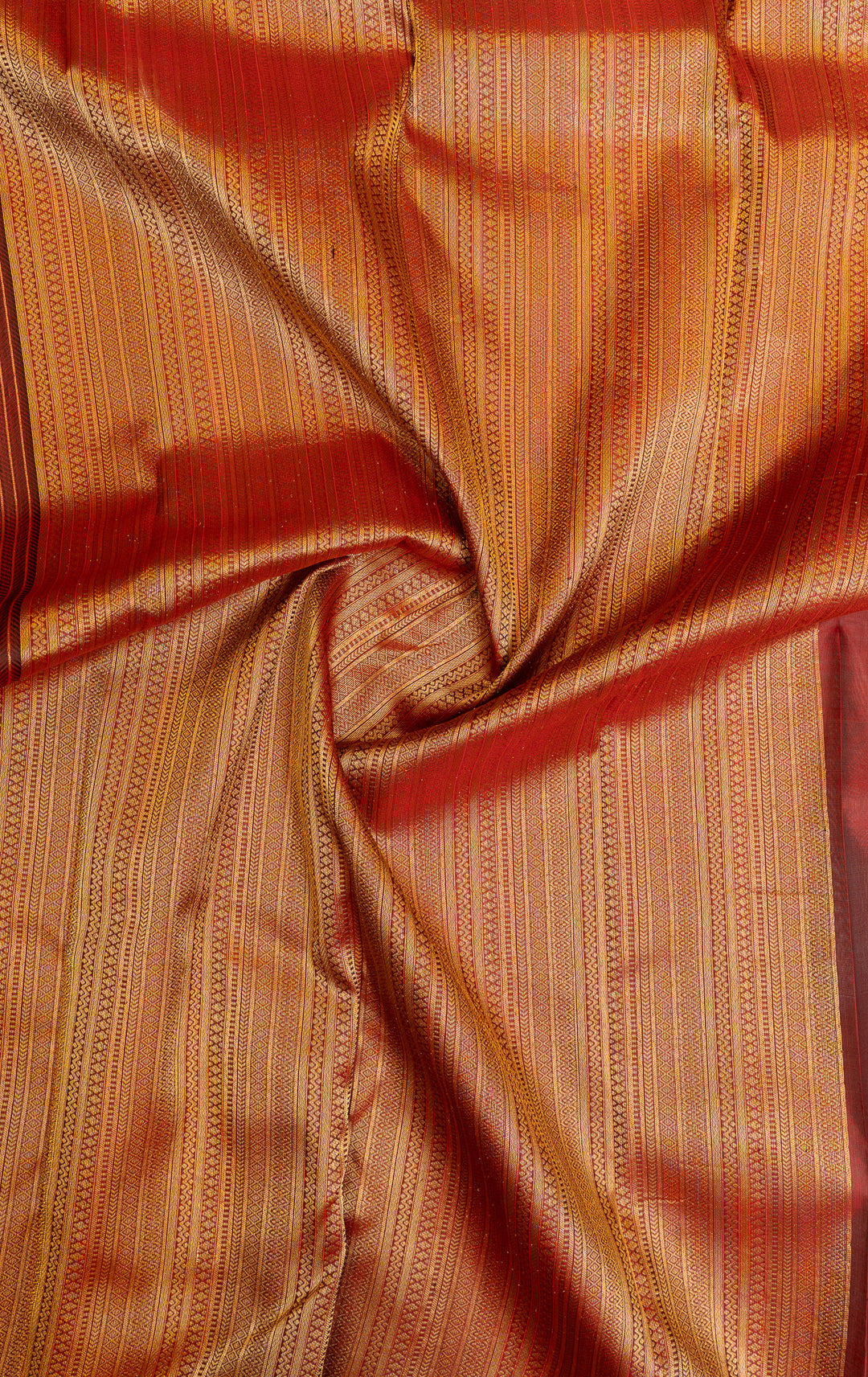 Maroon embossed pure Kanchipuram silk saree