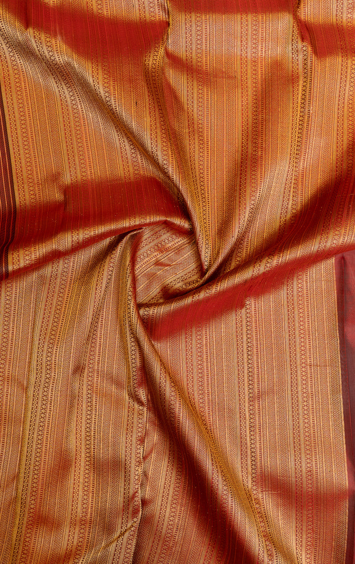 Maroon embossed pure Kanchipuram silk saree