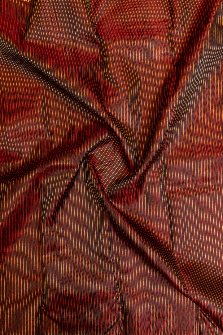 Maroon embossed pure Kanchipuram silk saree