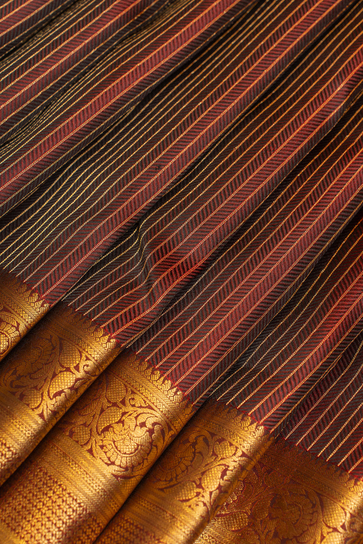 Maroon embossed pure Kanchipuram silk saree