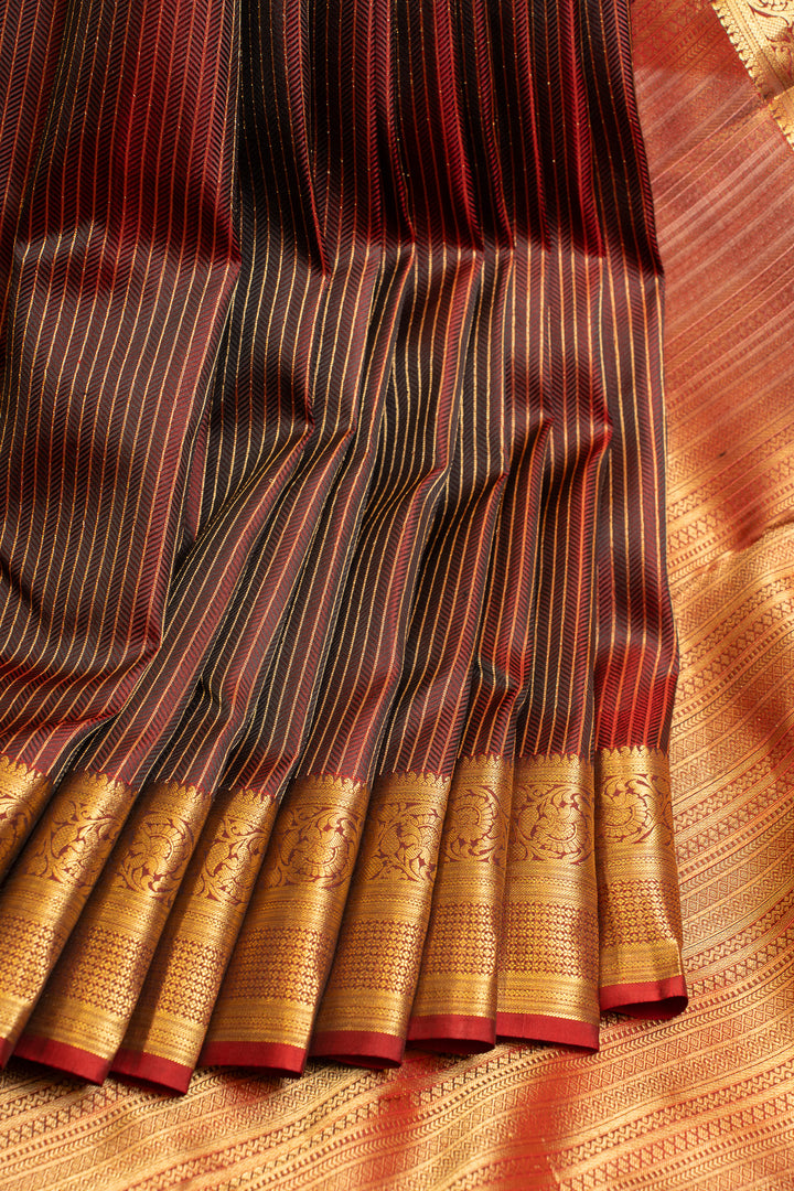 Maroon embossed pure Kanchipuram silk saree