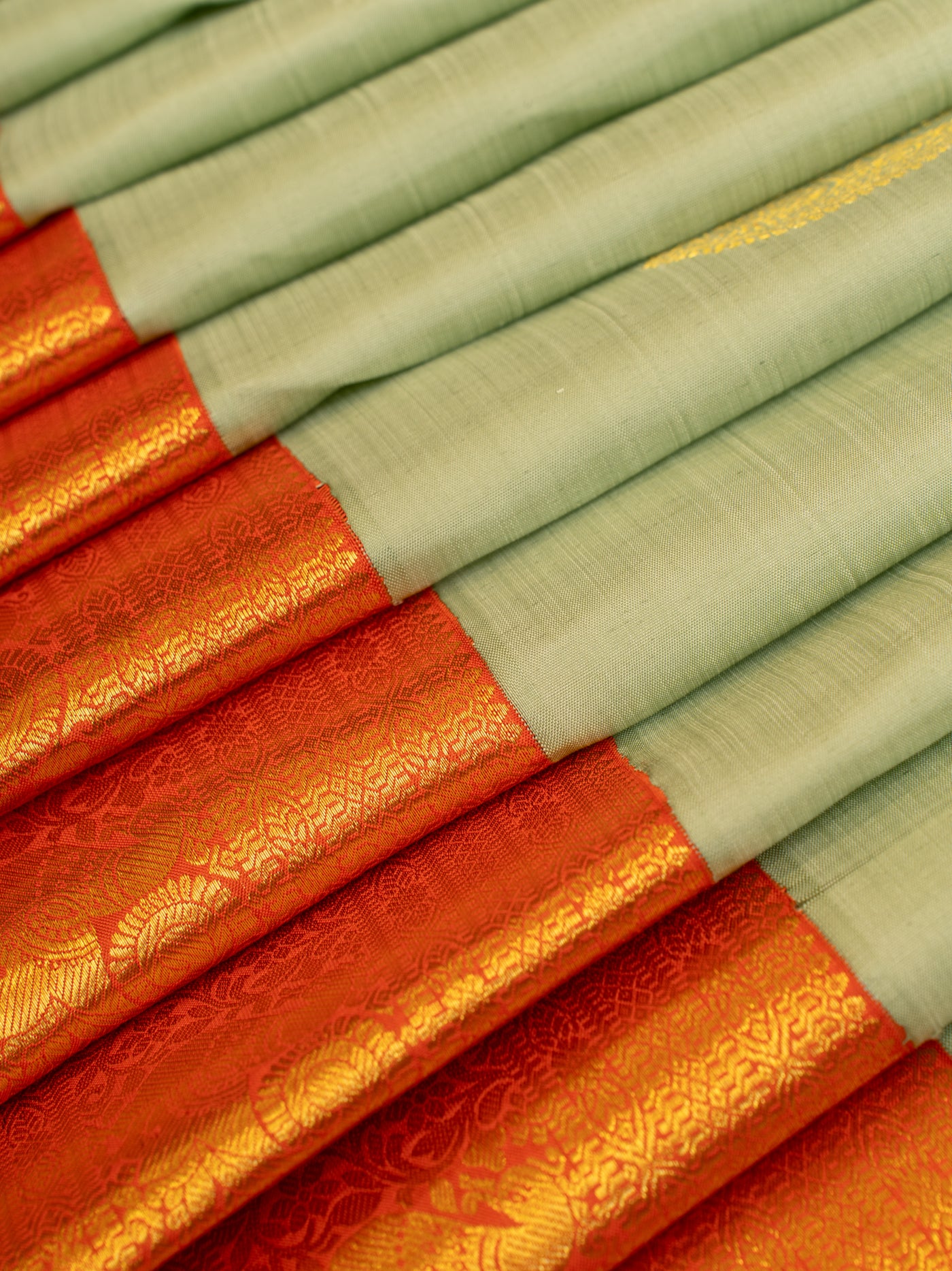 Apple green and orange traditional pure kanjivaram silk saree