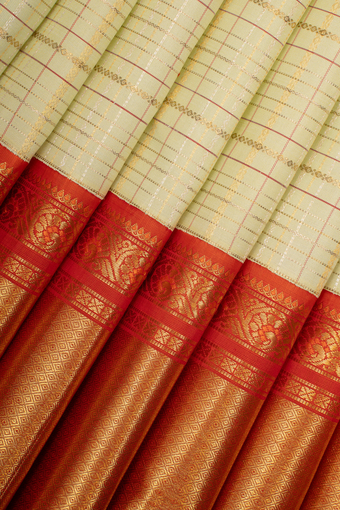 Pastel green and orange Zari checks pure kanchipuram silk saree