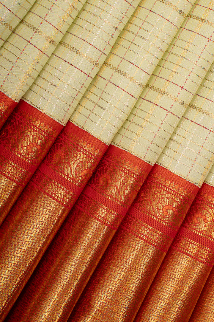 Pastel green and orange Zari checks pure kanchipuram silk saree