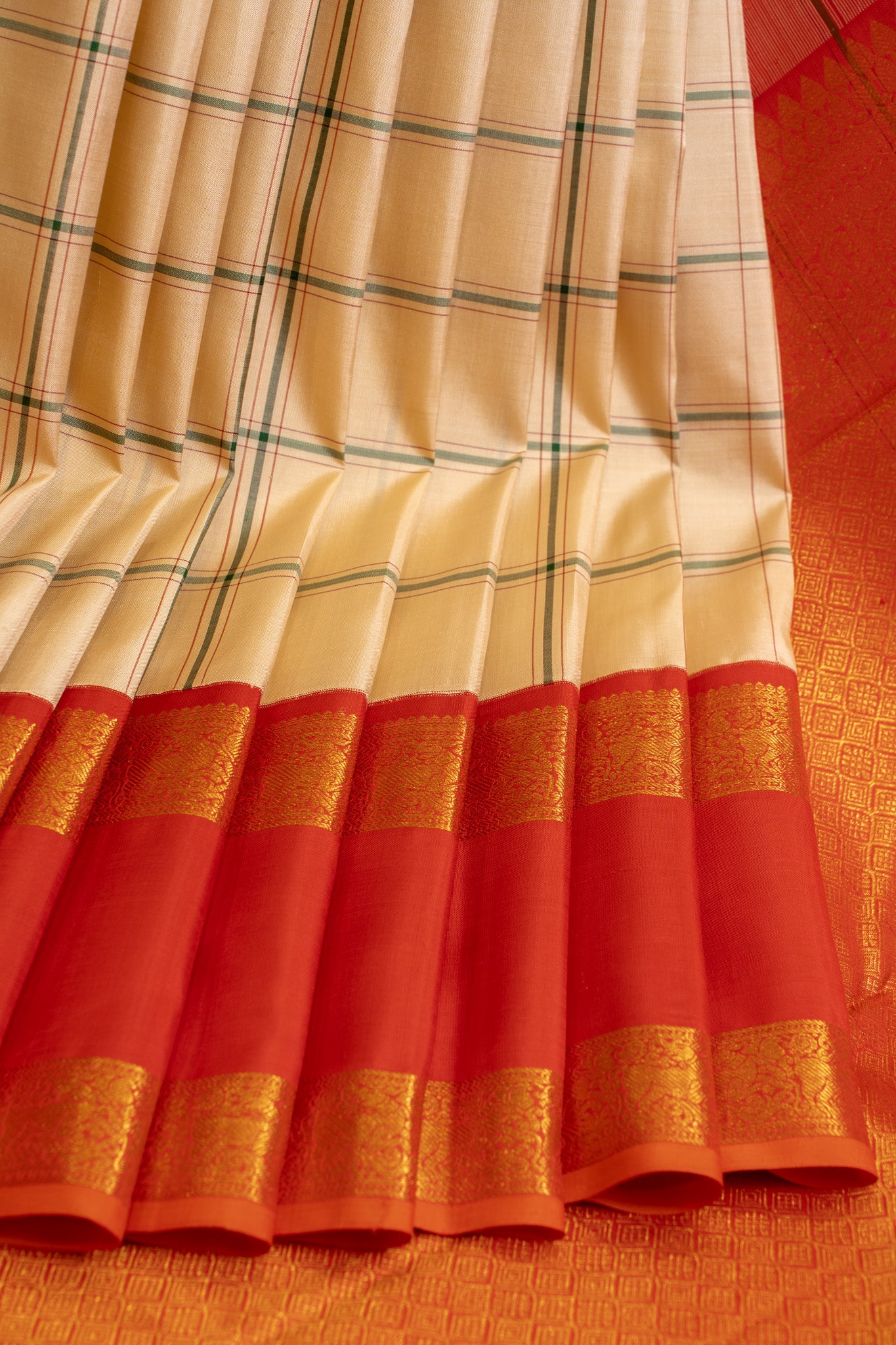 Off white and red rettai pettu pure zari Kanchipuram silk saree