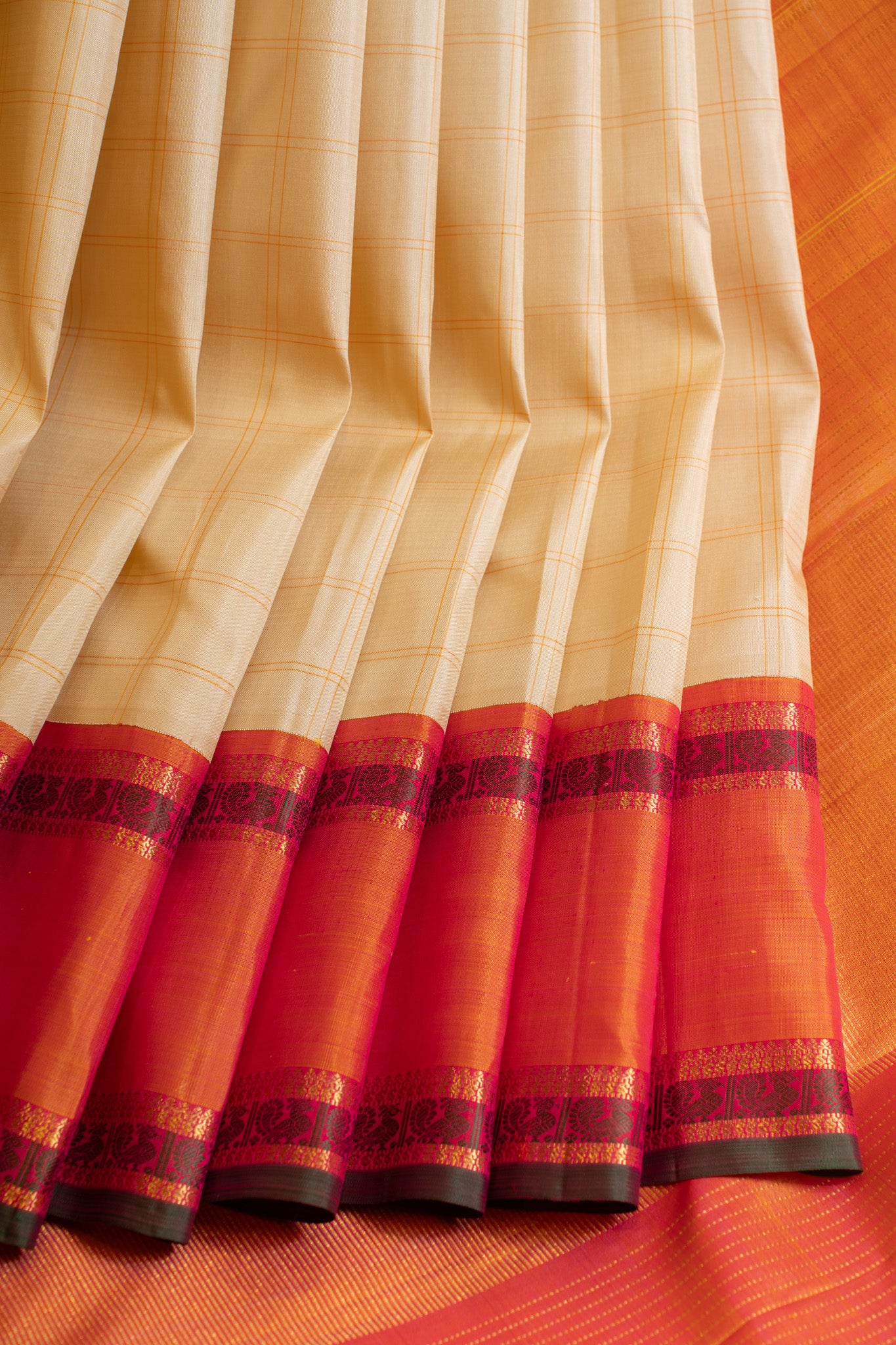 Off white checks and peach pure zari Kanchipuram silk saree