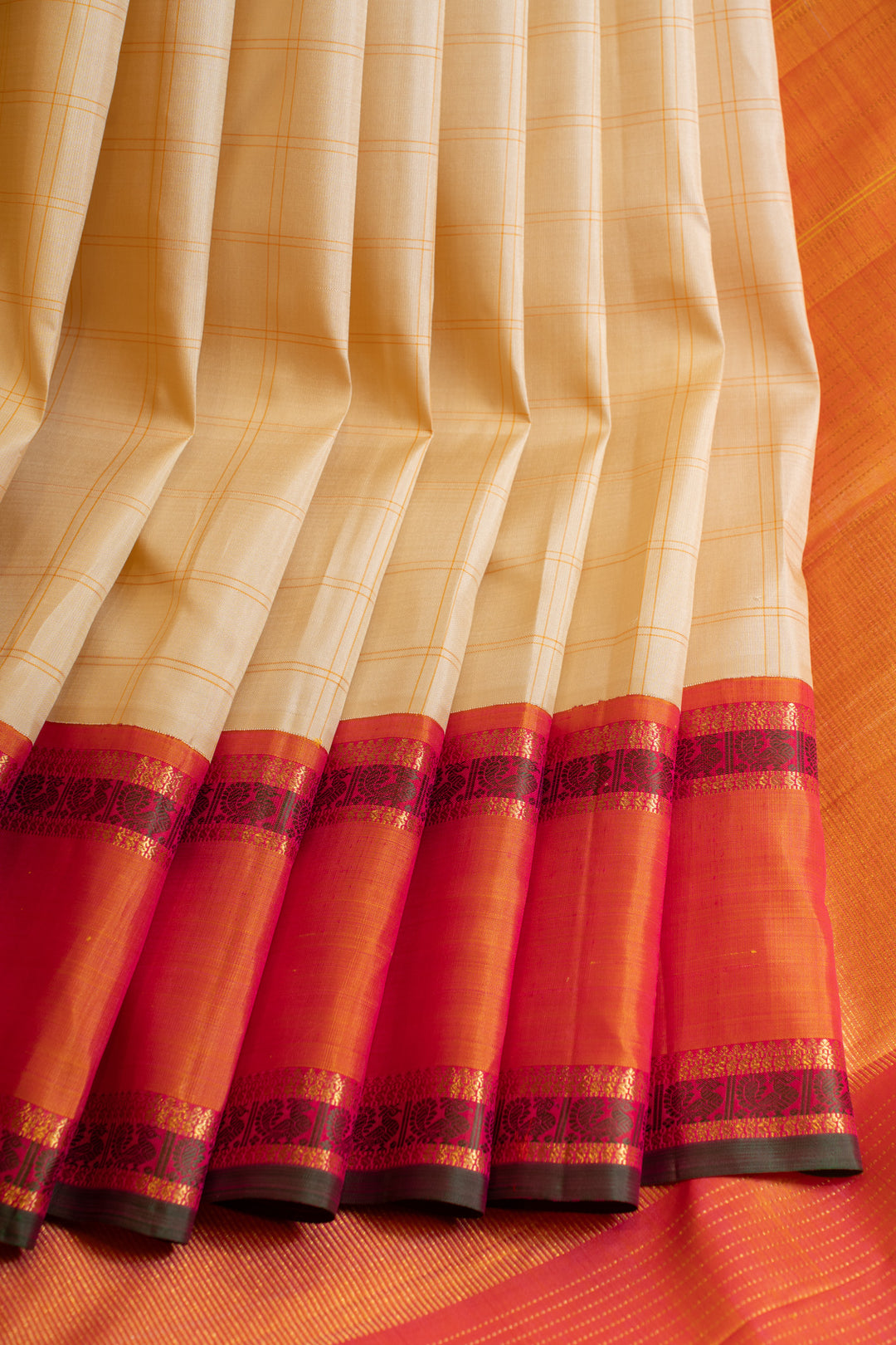 Off white checks and peach pure zari Kanchipuram silk saree