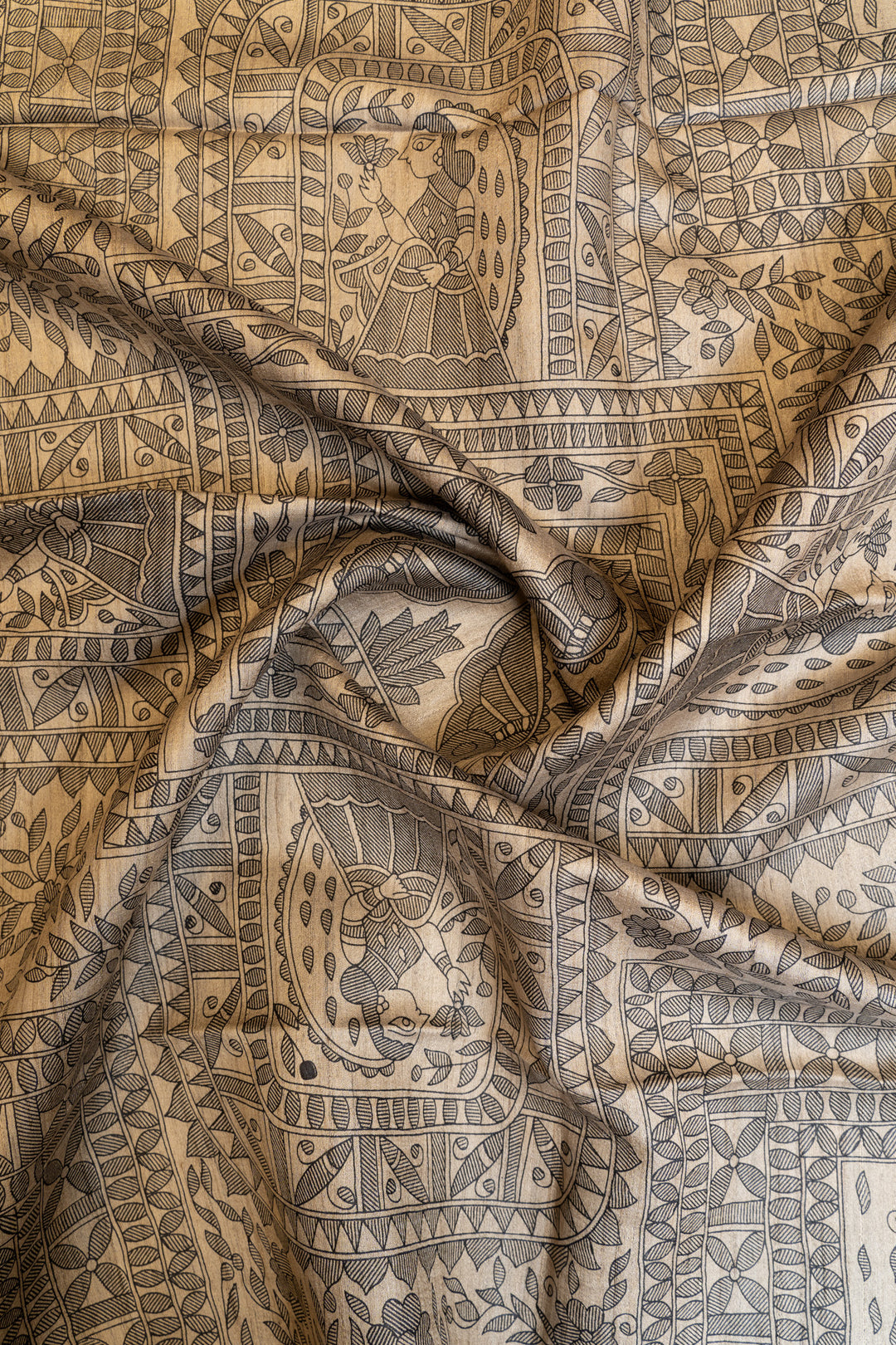 Beige and black Madhubani hand printed pure Tussar saree