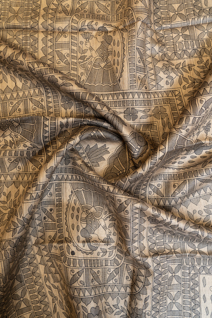 Beige and black Madhubani hand printed pure Tussar saree