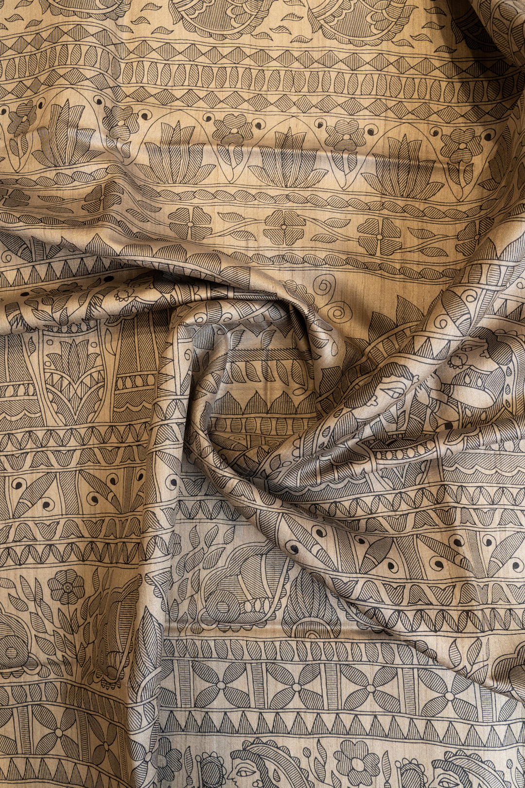 Beige and black Madhubani hand printed pure Tussar saree