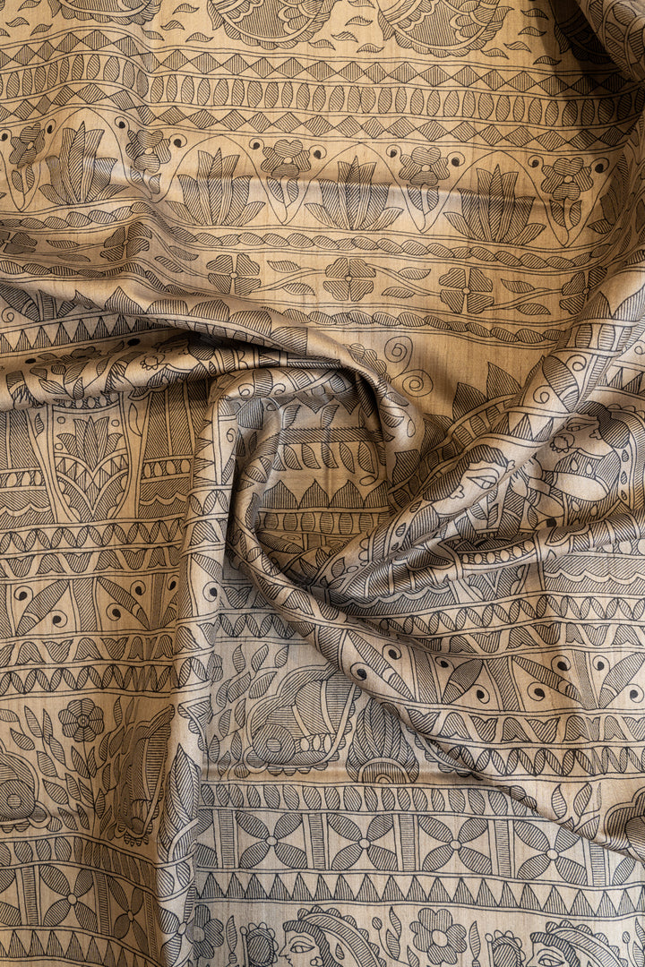 Beige and black Madhubani hand printed pure Tussar saree