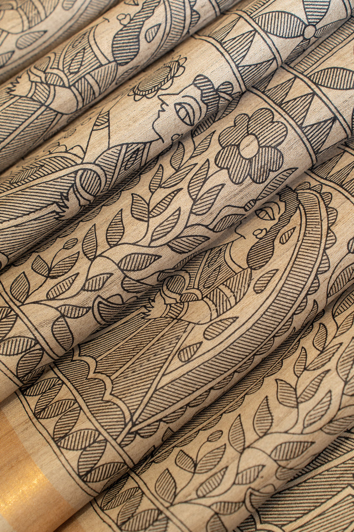 Beige and black Madhubani hand printed pure Tussar saree