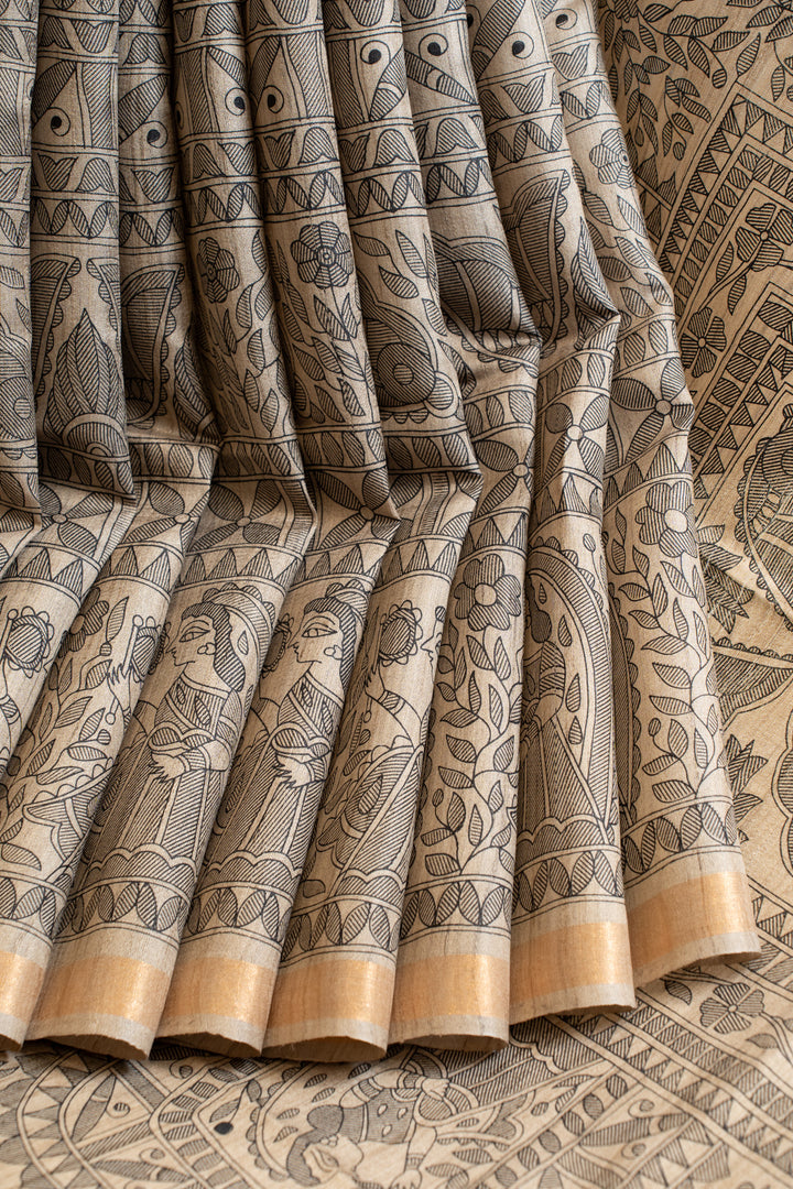 Beige and black Madhubani hand printed pure Tussar saree
