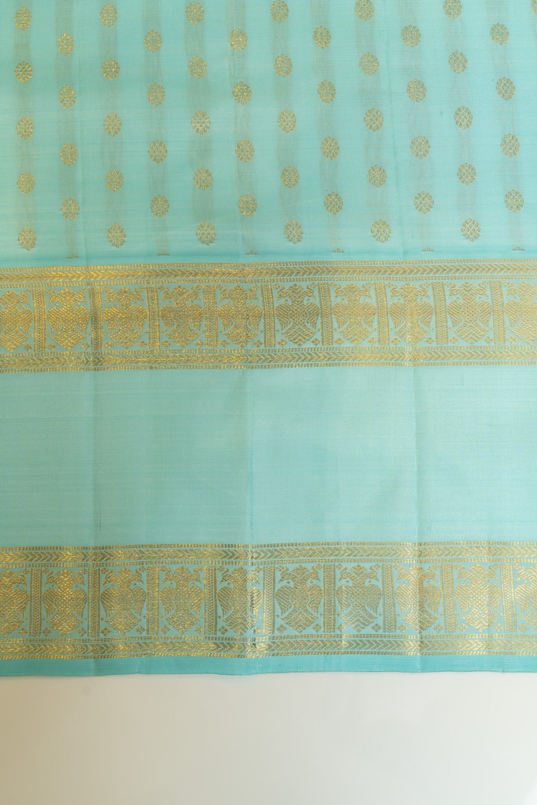 Peacock blue iruthalaipakshi rettai pettu pure zari Kanchipuram silk saree
