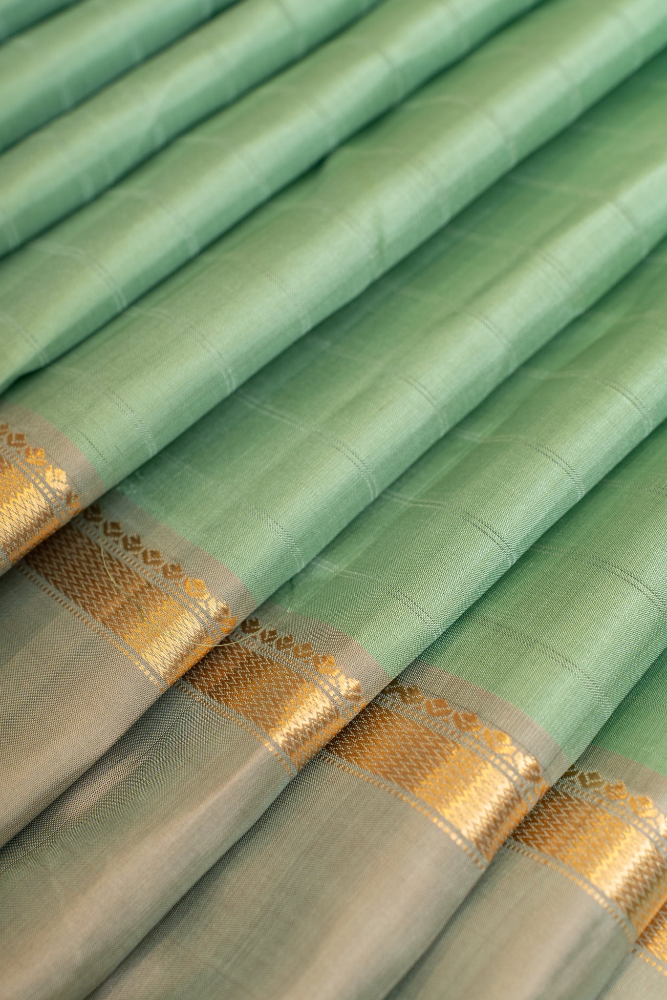 Teal green checks pure Kanchipuram silk saree