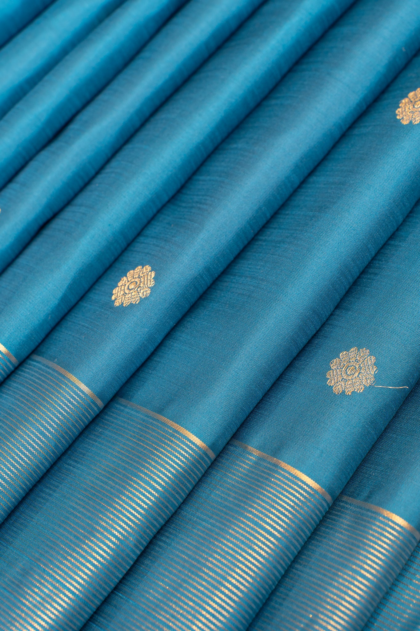 Peacock blue vairaoosi border pure Kanchipuram silk saree