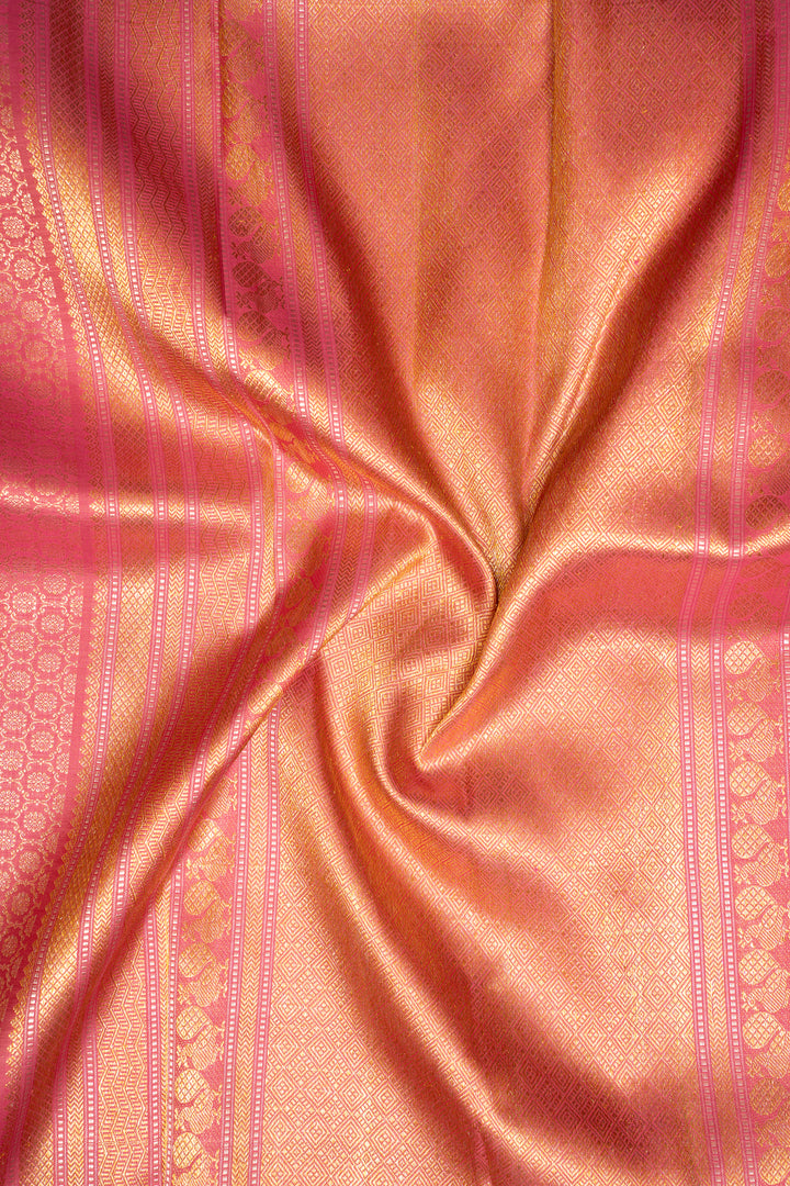 Luxurious silk adorned with intricate gold motifs, embodying timeless grace and opulence for a special occasion.