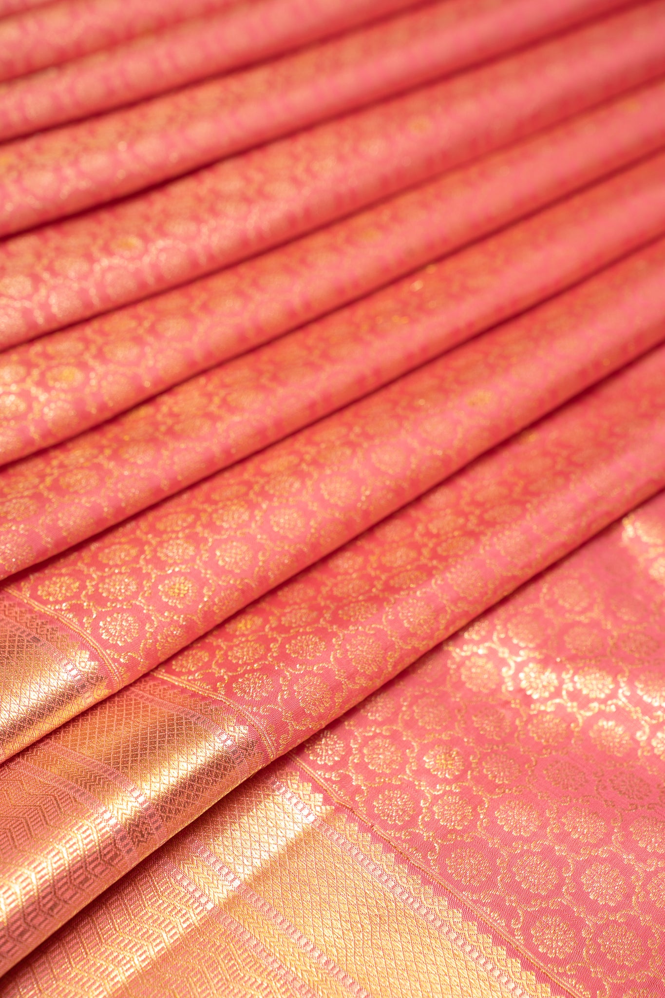 A rich tapestry of intricate motifs woven in lustrous silk, a symbol of timeless elegance and cultural heritage