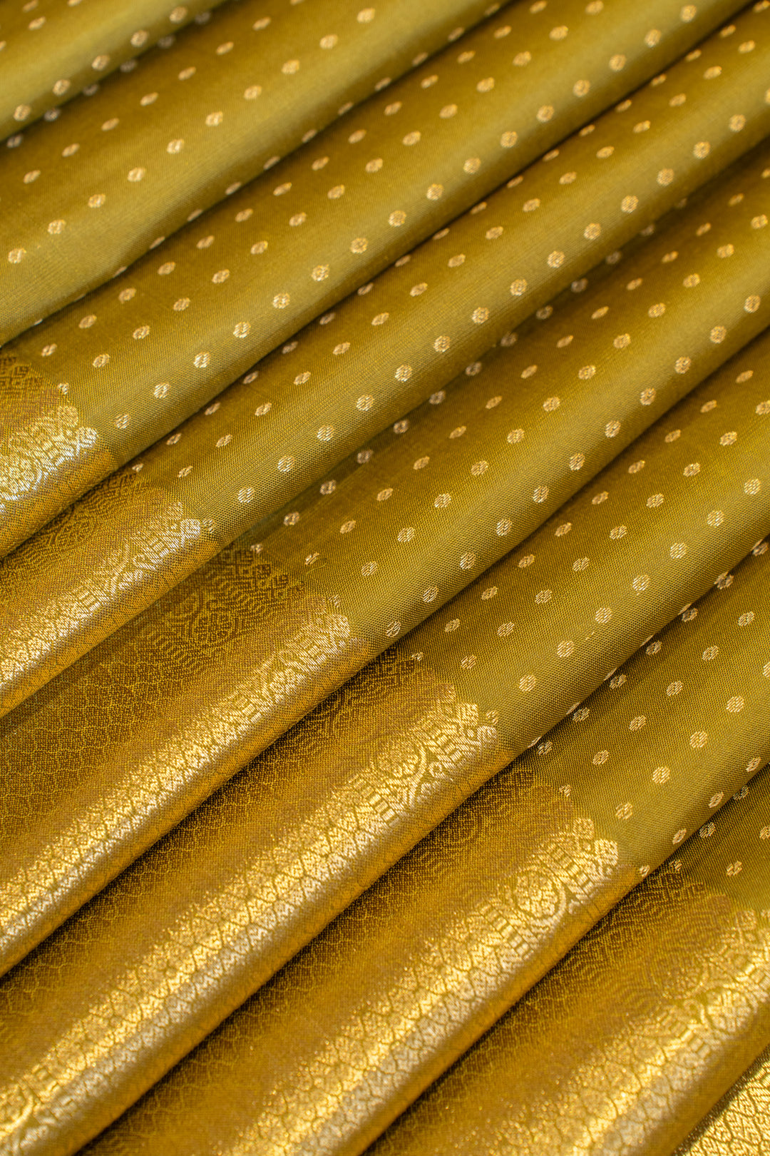 Olive green lakshadeepam pure Kanchipuram silk saree