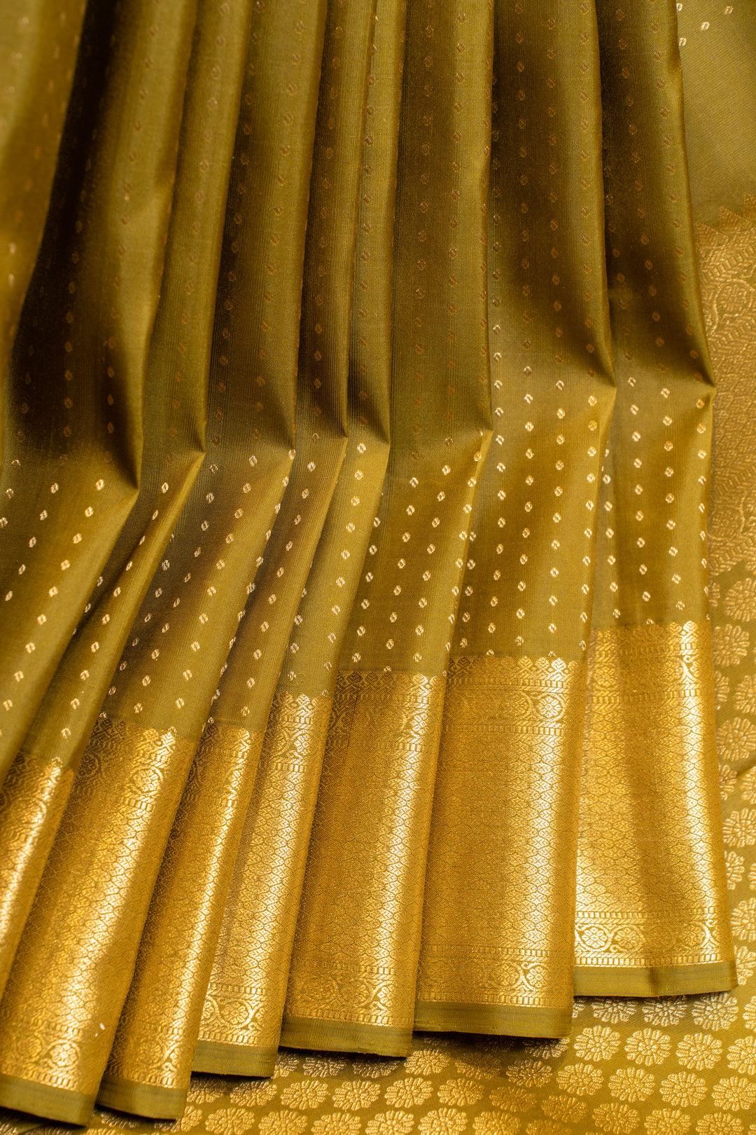 Olive green lakshadeepam pure Kanchipuram silk saree