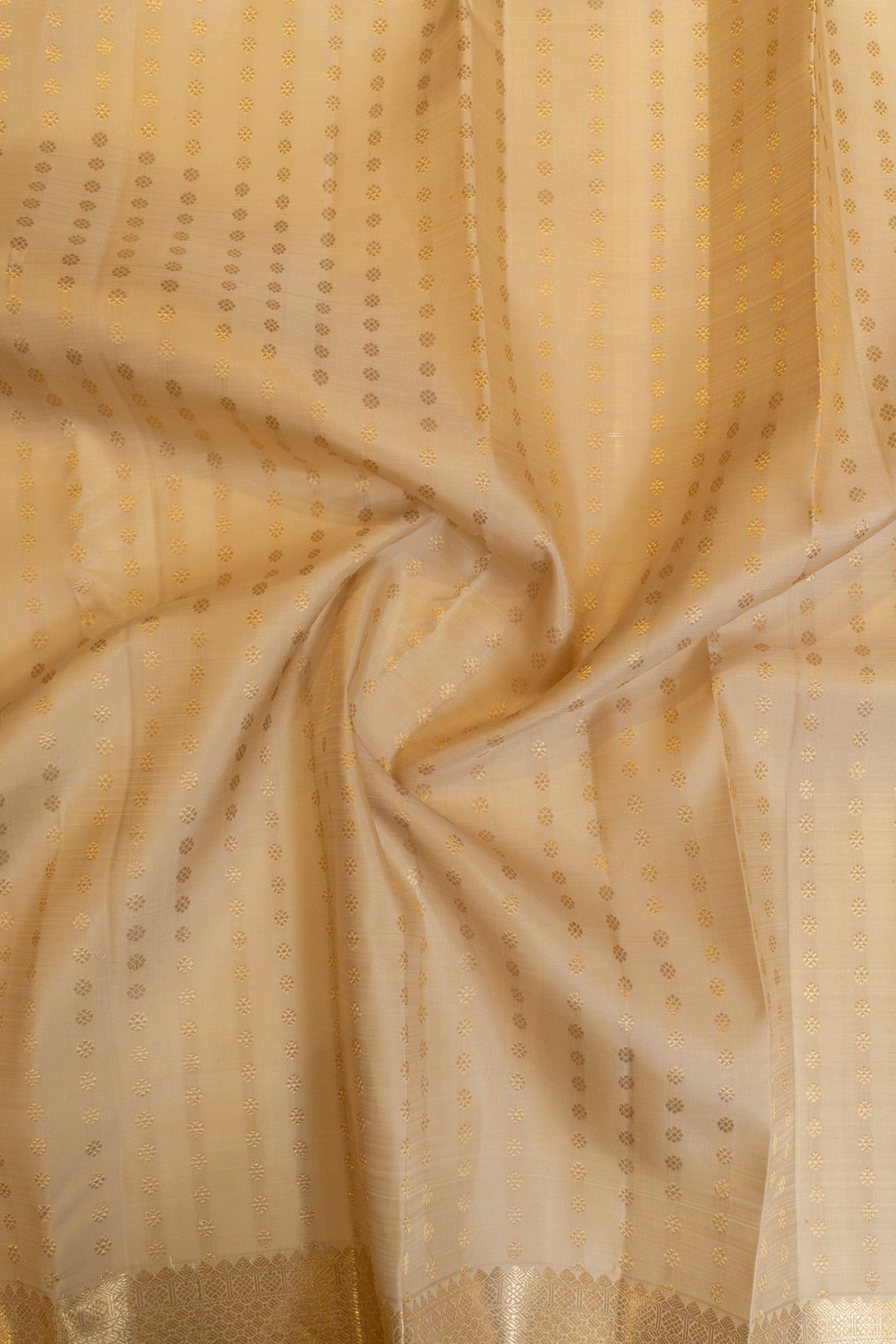 Beige and gold lakshadeepam pure Kanchipuram silk saree