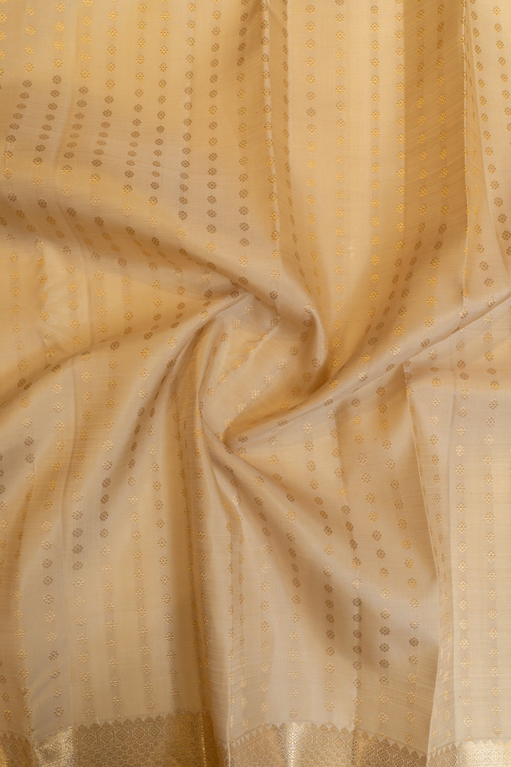 Beige and gold lakshadeepam pure Kanchipuram silk saree