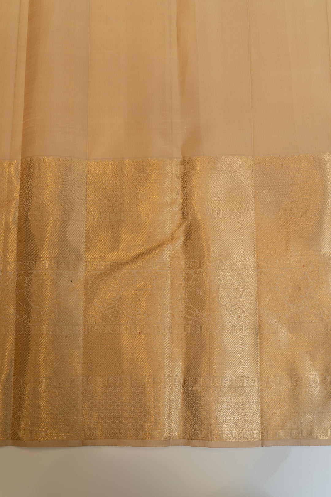 Beige and gold lakshadeepam pure Kanchipuram silk saree