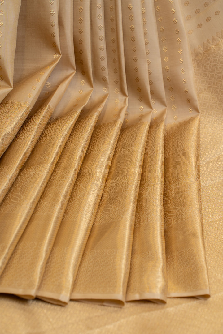 Beige and gold lakshadeepam pure Kanchipuram silk saree