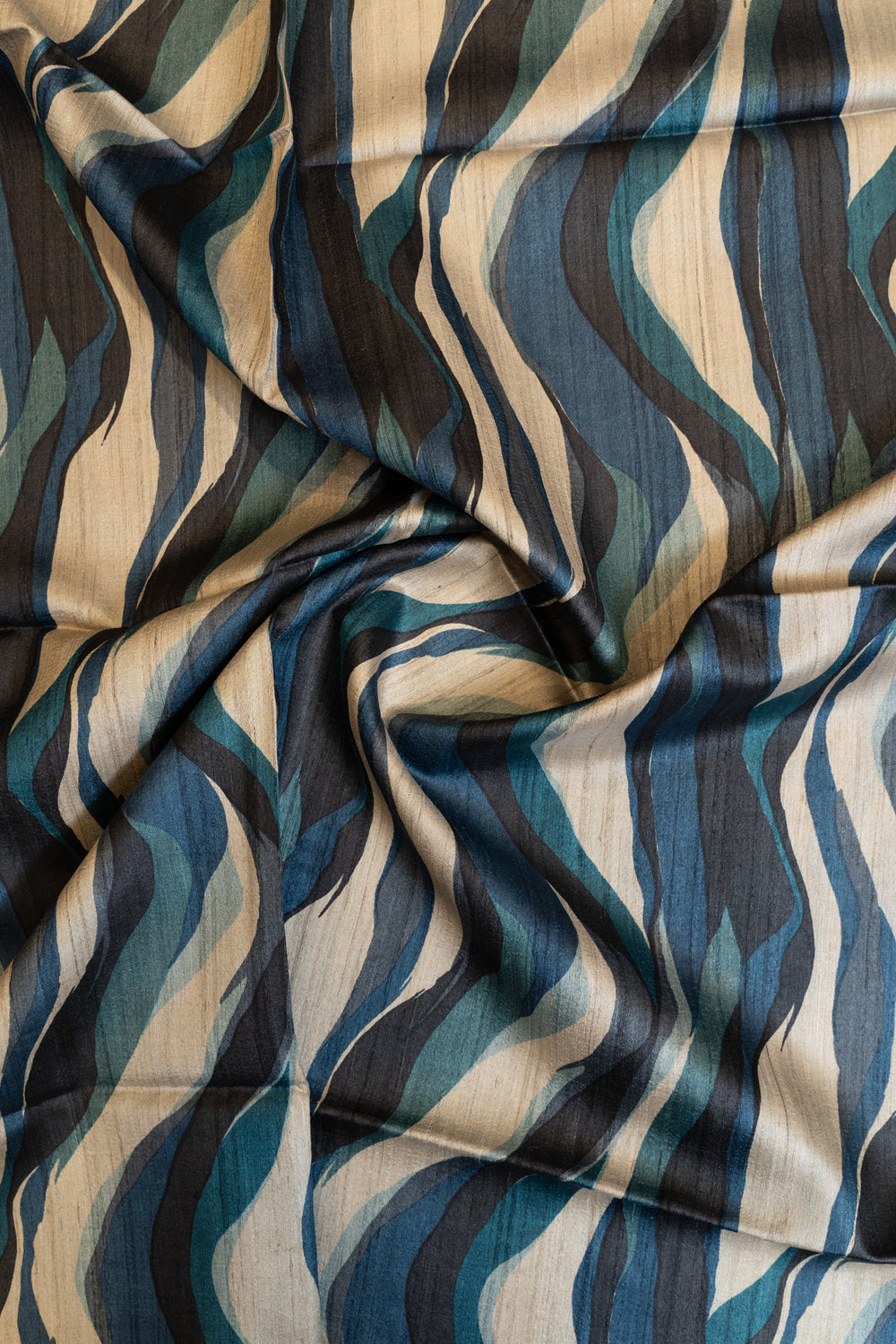 Beige and blue abstract handprinted pure Tussar saree