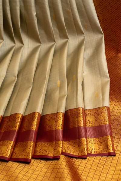 Elaichi green checks pure Kanchipuram silk saree